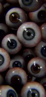 Abstract pattern of realistic eyeballs in mobile wallpaper design.