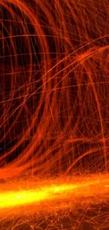 Abstract wallpaper with fiery light trails in orange and black hues.