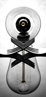 Black and white abstract wallpaper with forks and light bulb.