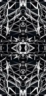 Intricate black and white geometric pattern wallpaper.