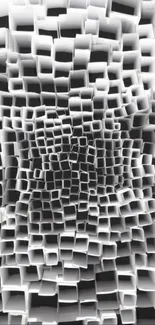 Abstract 3D geometric wallpaper with black, white, and gray shades.