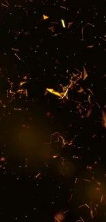 Abstract wallpaper with golden sparks illuminating a dark background.