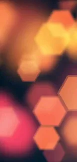 Abstract orange hexagon light wallpaper with glowing effects.