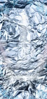 Reflective foil texture with shiny, crumpled appearance.