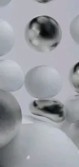 Abstract metallic spheres in grayscale mobile wallpaper.