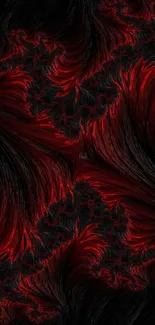 Abstract red and black wallpaper with swirling patterns.