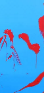 Abstract red brush strokes on blue background wallpaper.