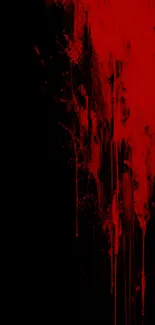 Vibrant abstract red paint splash wallpaper on a dark background.