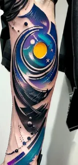 Futuristic abstract tattoo design on forearm with cosmic elements.