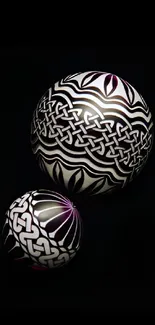 Abstract spheres with geometric patterns on a black background, elegant and modern.