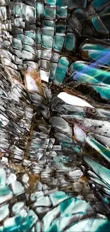 Abstract teal mosaic wallpaper with artistic design.