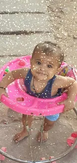 Adorable baby in a pink walker enjoying an outdoor setting.