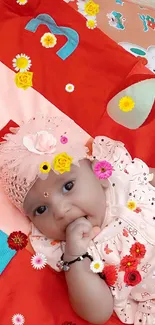 Adorable baby lying on a colorful play mat.