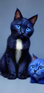 Cute blue cats with striking blue eyes on a wallpaper.