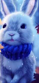 Cute bunny with blue scarf in autumn leaves.