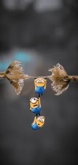 Animated characters humorously hang from a frayed rope.