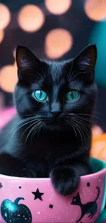 Charming black cat with teal eyes in a colorful cup.