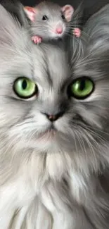 Fluffy white cat with green eyes and a small mouse on its head.