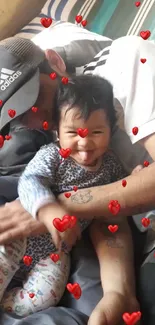 Joyful father hugging playful child on cozy bed.