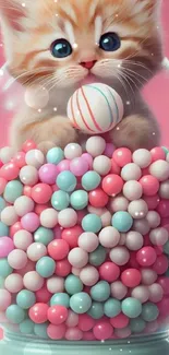 Adorable orange kitten in a candy jar with colorful pastel balls.