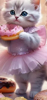 Kitten in pink tutu enjoying a pink donut.