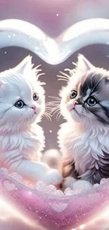 Two adorable kittens in a heart-shaped frame.