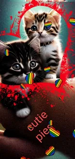 Adorable kittens in a heart with colorful design on mobile wallpaper.