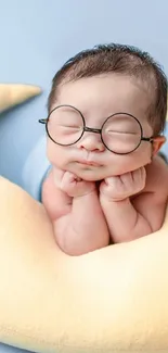 Adorable sleeping baby on a crescent moon with stars.