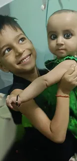 Two children sharing a loving embrace, one wearing a green dress.