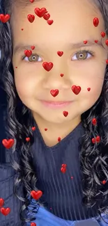 Adorable child with red hearts mobile wallpaper.