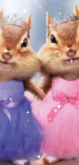 Two cute squirrels in ballet tutus, one in purple and the other in pink.