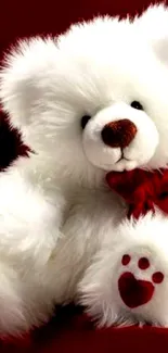 Adorable fluffy teddy bear with red bow.