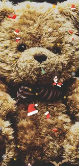 Fluffy teddy bear sitting on a stone surface outdoors, perfect mobile wallpaper.