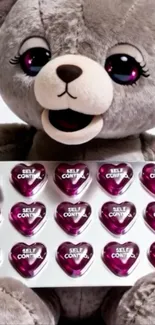Cute gray teddy bear with heart-shaped tray