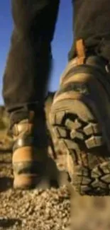 Close-up of boots walking on a desert trail, symbolizing adventure.