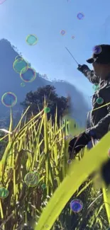 Man pointing in scenic mountain landscape with bubbles and vibrant greenery.