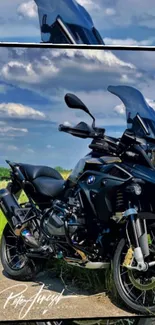 Adventure motorcycle parked on a scenic road with a clear blue sky.