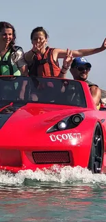 Red water car with passengers enjoying a sunny ocean ride.