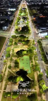 Aerial view of a cityscape beautifully lit up at night.