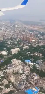 Aerial view of city from airplane window.