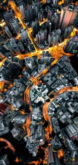 Aerial view of illuminated city skyline at night.