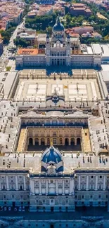 Aerial view of a historic European palace, showcasing intricate architecture.