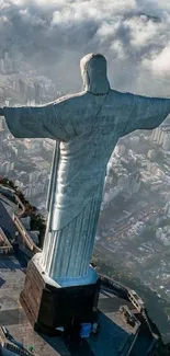 Aerial view of Christ the Redeemer statue overlooking Rio de Janeiro city.