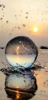 Sunset reflecting in a glass orb with water droplets.