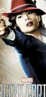 Agent Carter in blue suit with a red hat holding a gun.