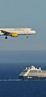 Airplane flying above a cruise ship on blue ocean water.