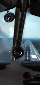 Airplane cockpit view with runway ahead and sky blue horizon.