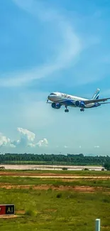 Airplane landing on a runway under a clear blue sky.