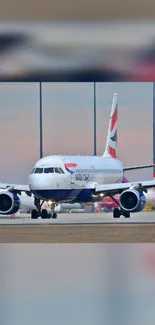 Airplane on runway with vibrant sky background