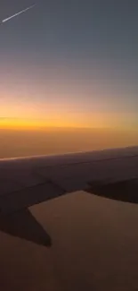 Airplane wing against a stunning sunset sky.